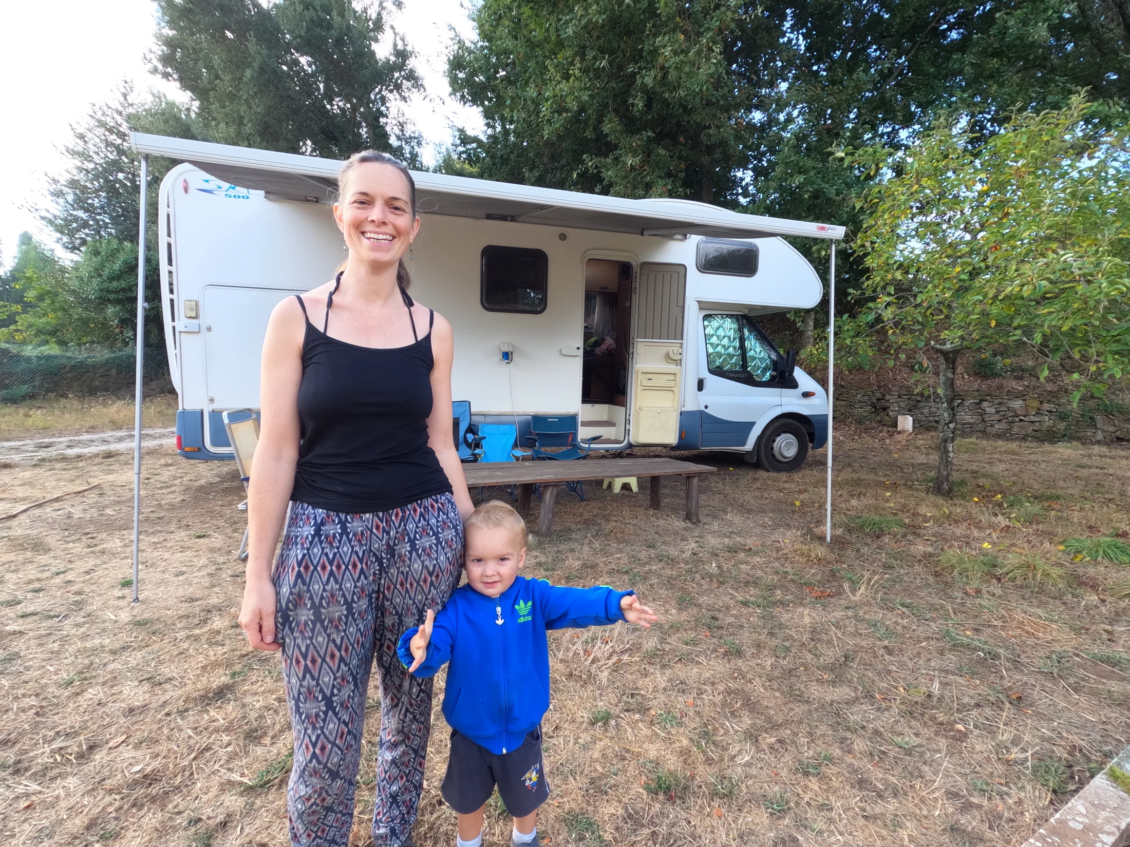 Ros and Wilfy beside BATC, the family's Ford Transit campervan, during their Scandinavian road trip