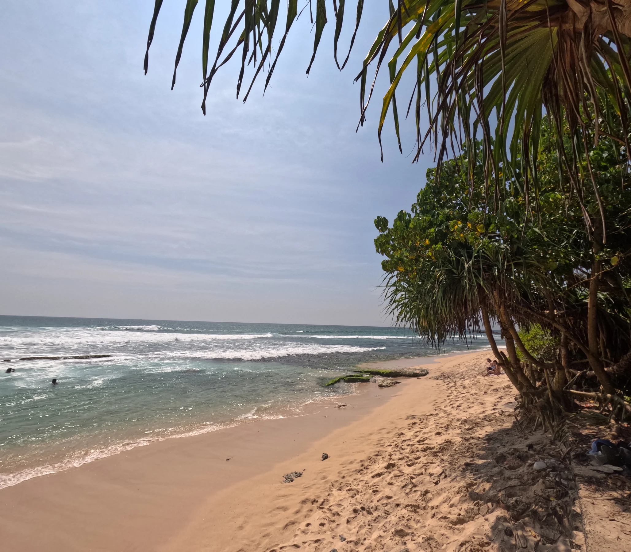 A quiet tropical beach visited during the family's worldschooling trip to Sri Lanka