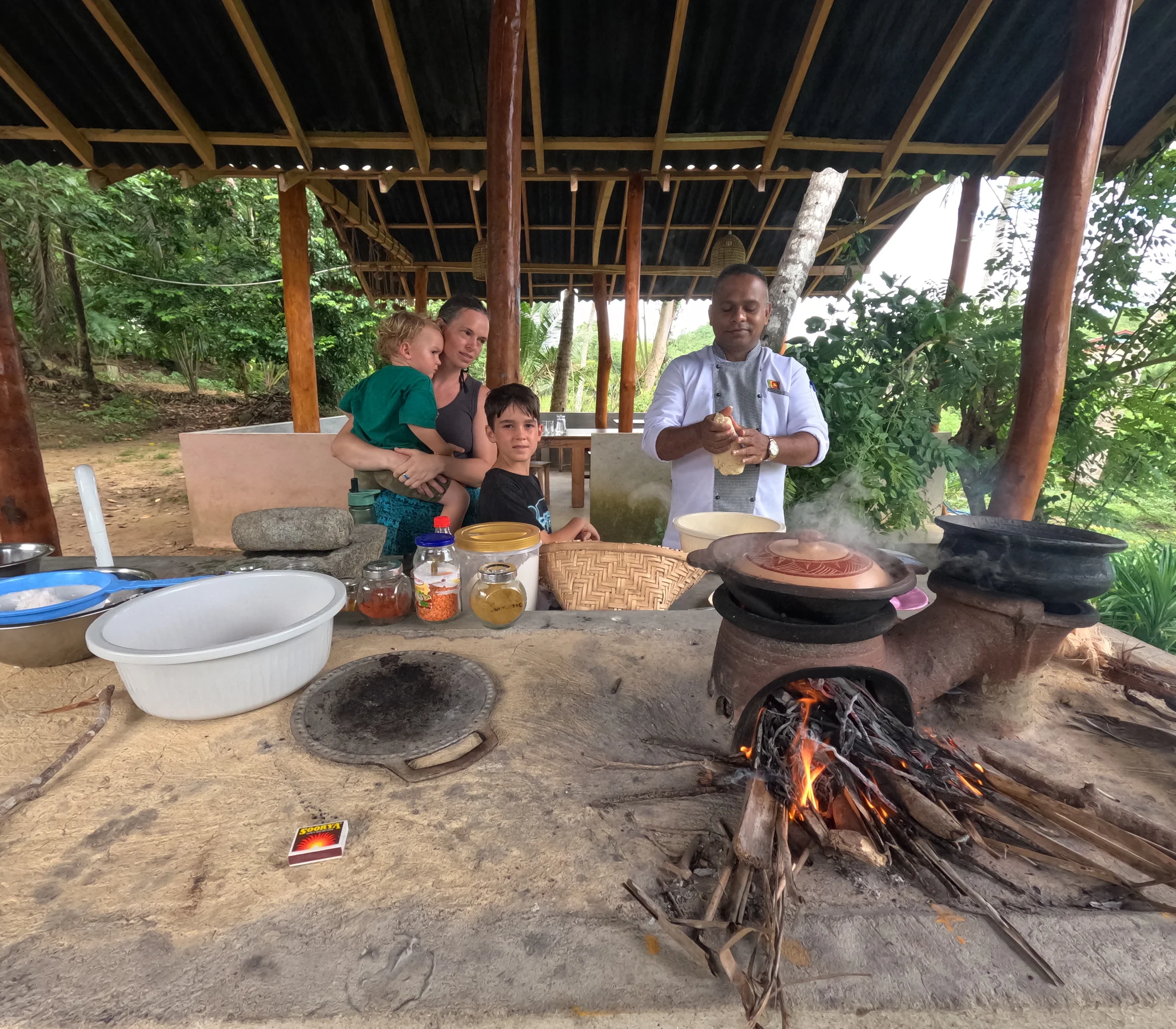 Ros, Lawrie and Wilfy learning to prepare traditional Sri Lankan food with a local cook