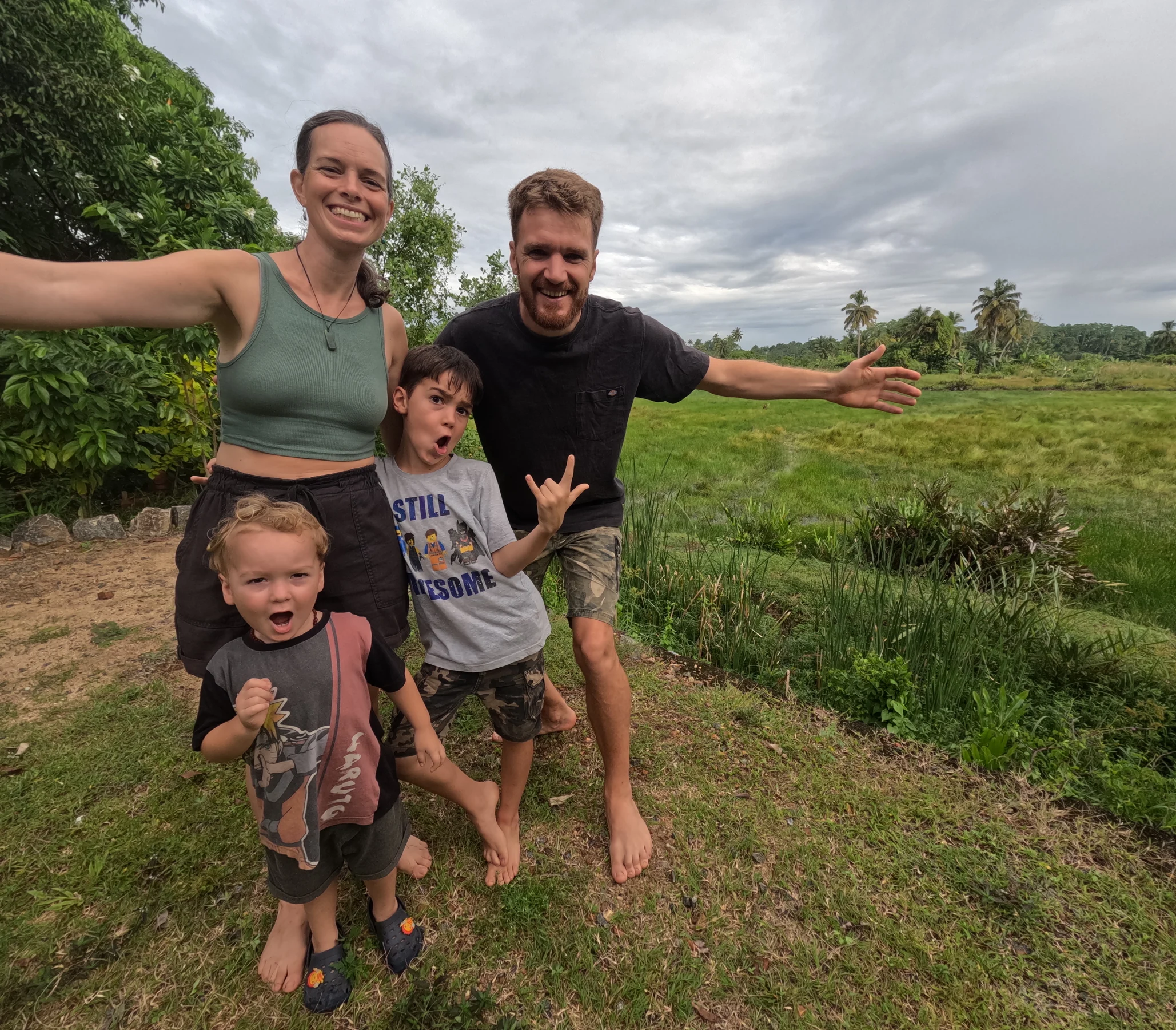 Tom, Ros, Lawrie and Wilfy together beside rice fields in Sri Lanka